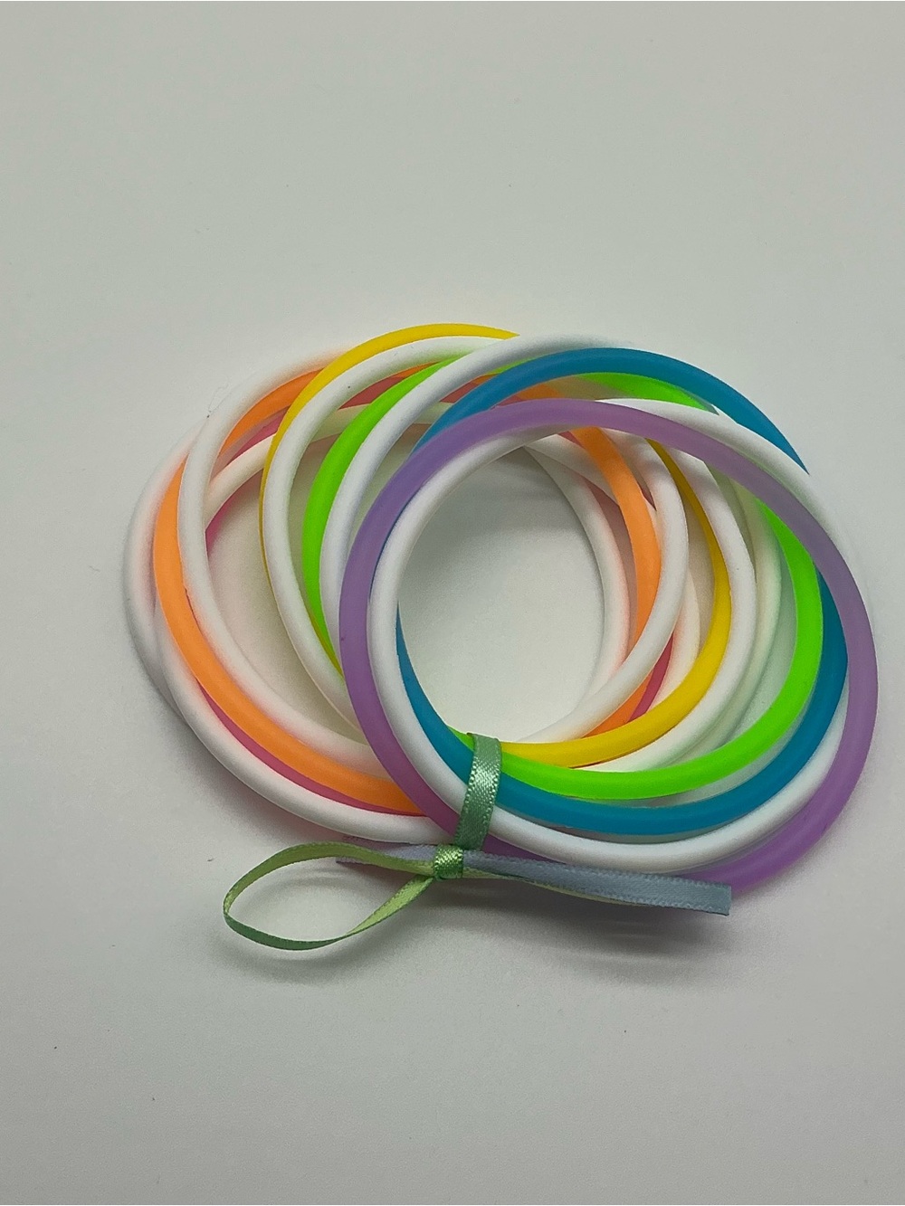 Set of 12 White and Pastel Rainbow Colored Jelly Bracelets